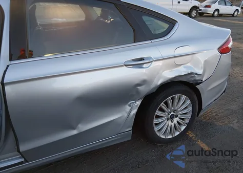 2014 Ford Fusion Hybrid Se z USA, uszkodzony, nr VIN 3FA6P0LU4ER242422